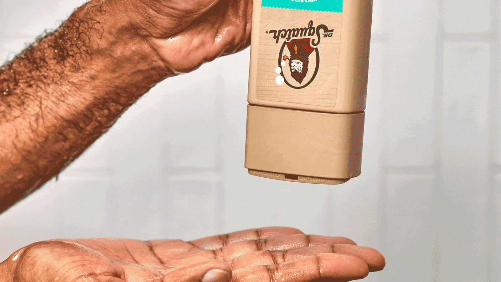 Dr. Squatch Coconut Castaway Hair Care Kit gift set being used