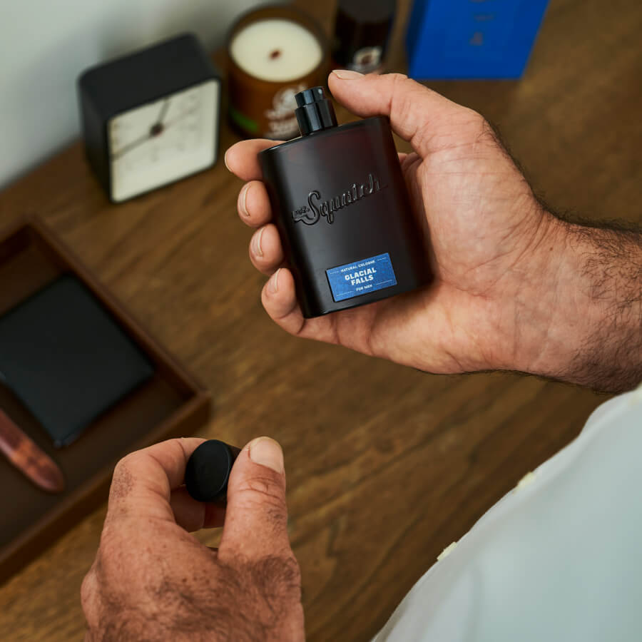 Promotional graphic for Dr. Squatch Glacial Falls Cologne with Free Deo!