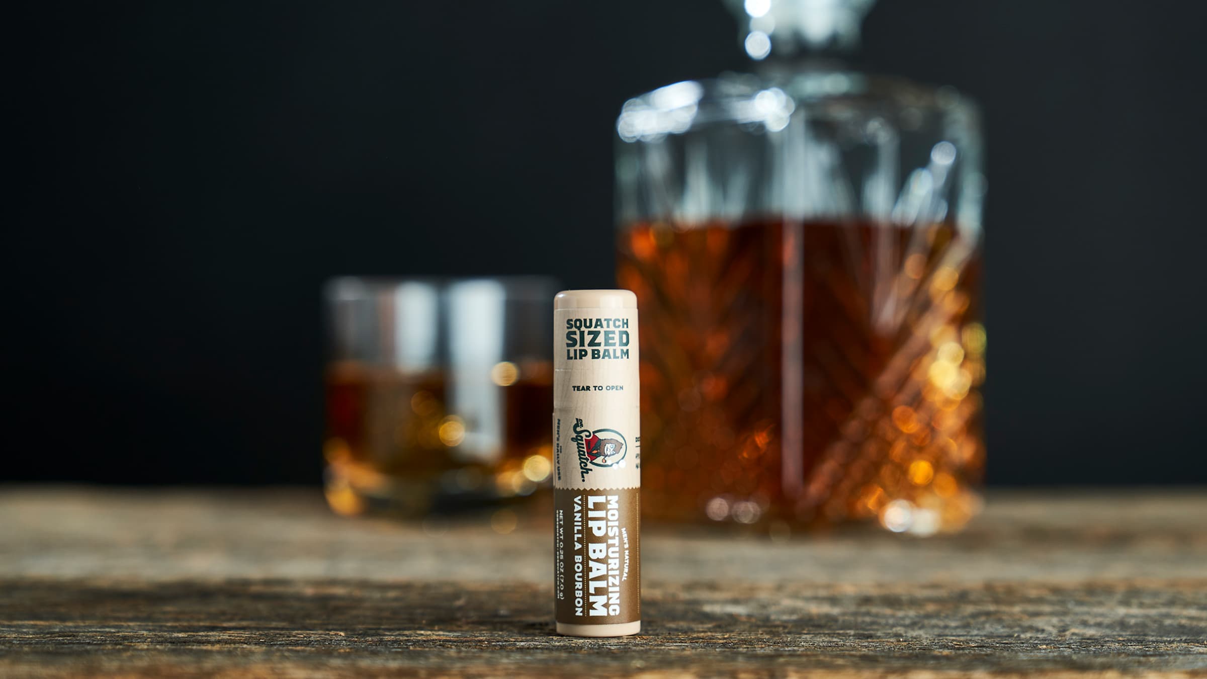 Lifestyle photo featuring Dr. Squatch Vanilla Bourbon Lip Balm