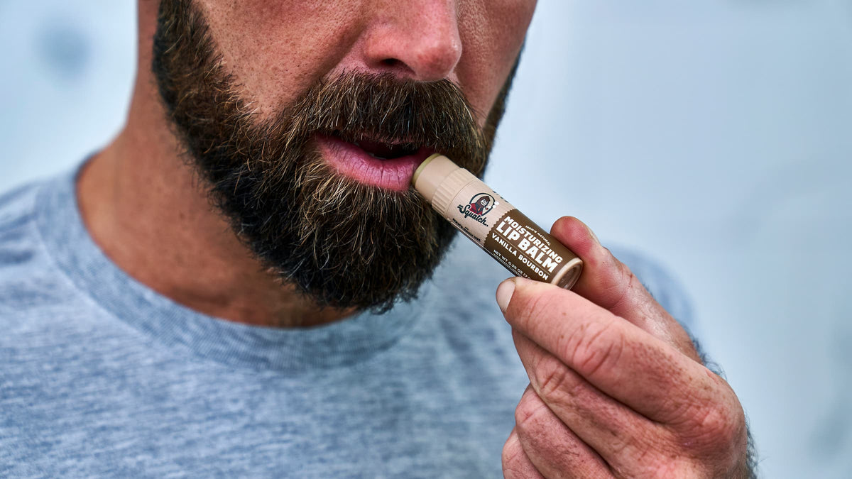 Dr. Squatch Vanilla Bourbon Lip Balm being used